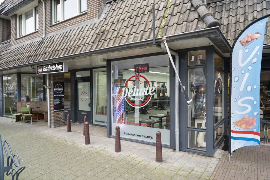 Gevel van Barbershop DeLuxe